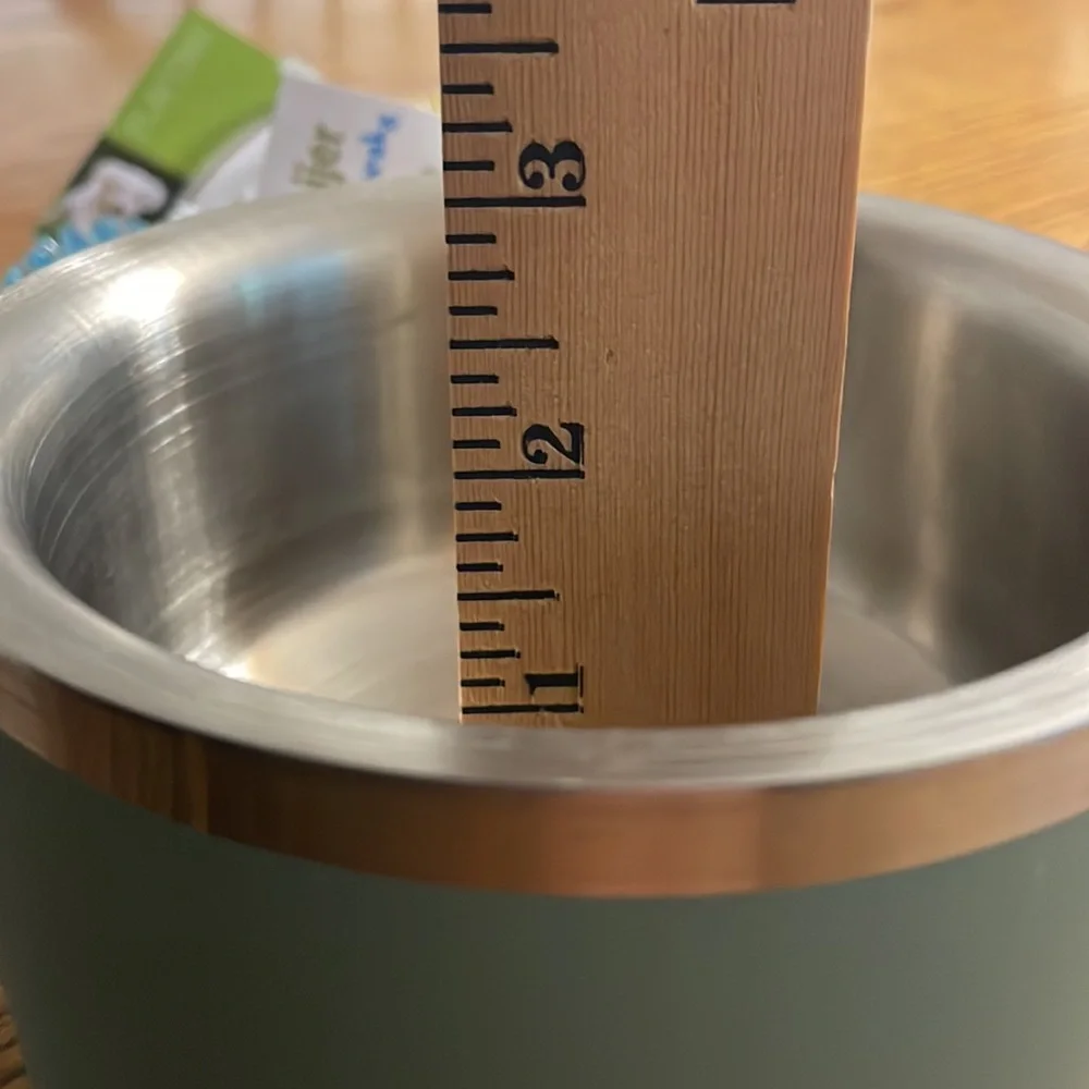 Double wall feeding bowl and a small squeaky bone bundle